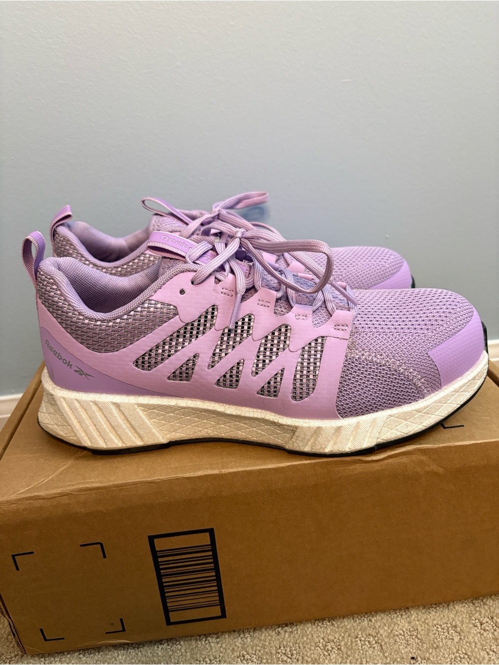 Reebok Women's Lavender Mesh working Sneakers. Composite toe.